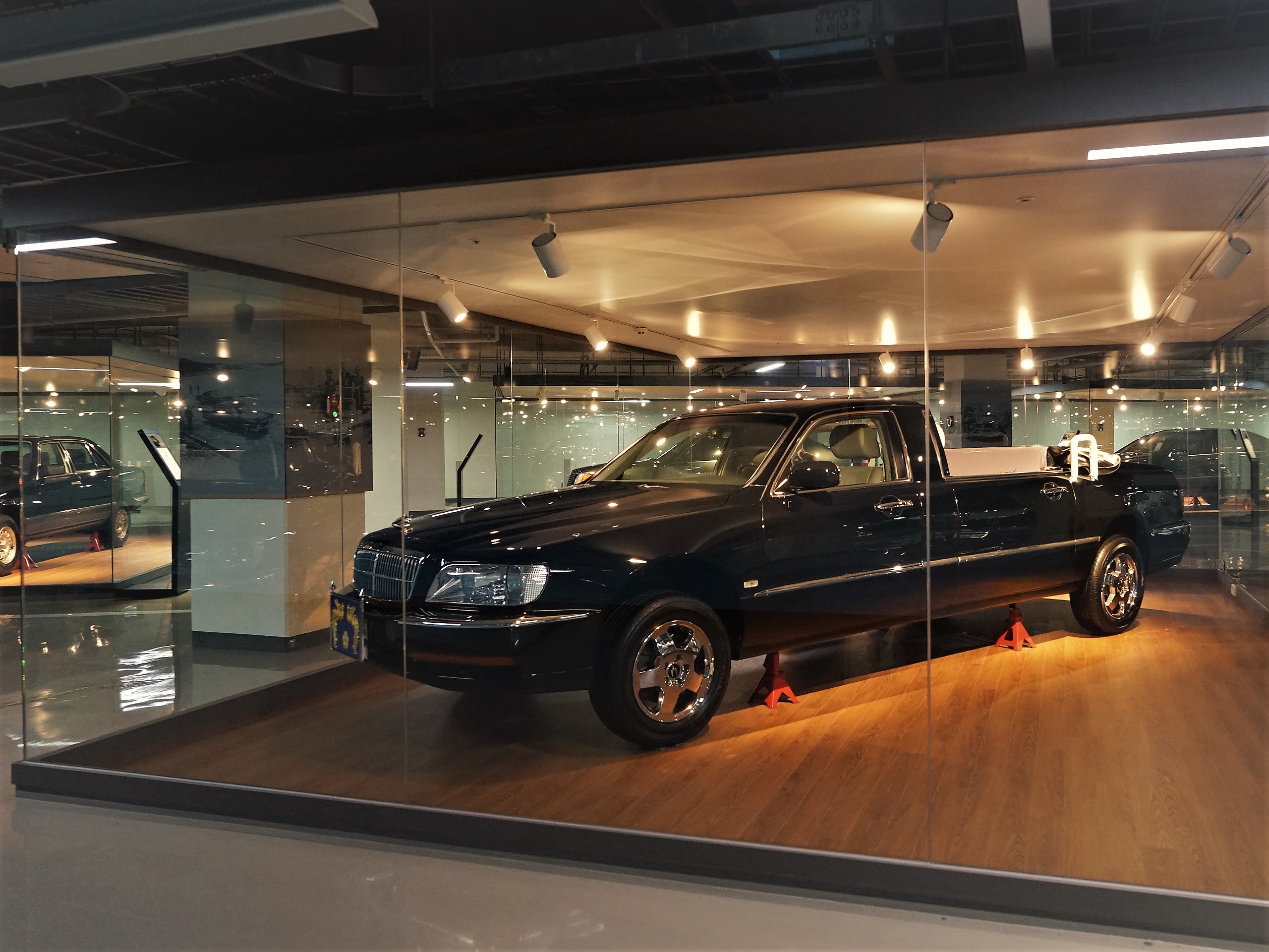 The ceremonial vehicles of past presidents are exhibited.